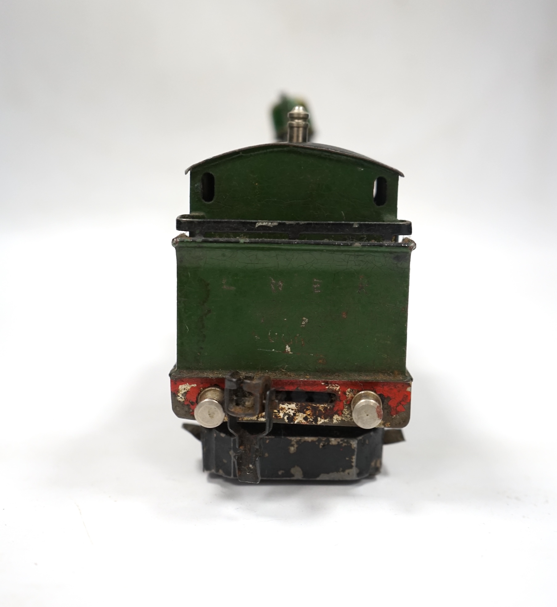 A Trix Twin Railway 00 gauge train set box containing; four locomotives, eight bogie coaches, two railcars, and six freight wagons, together with a live steam Marklin 0-4-0T LNER locomotive. Condition - poor to fair.